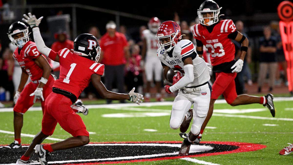 Manatee’s Torey Gilles runs the ball against Palmetto on Friday, Oct. 27, 2023 in Palmetto.