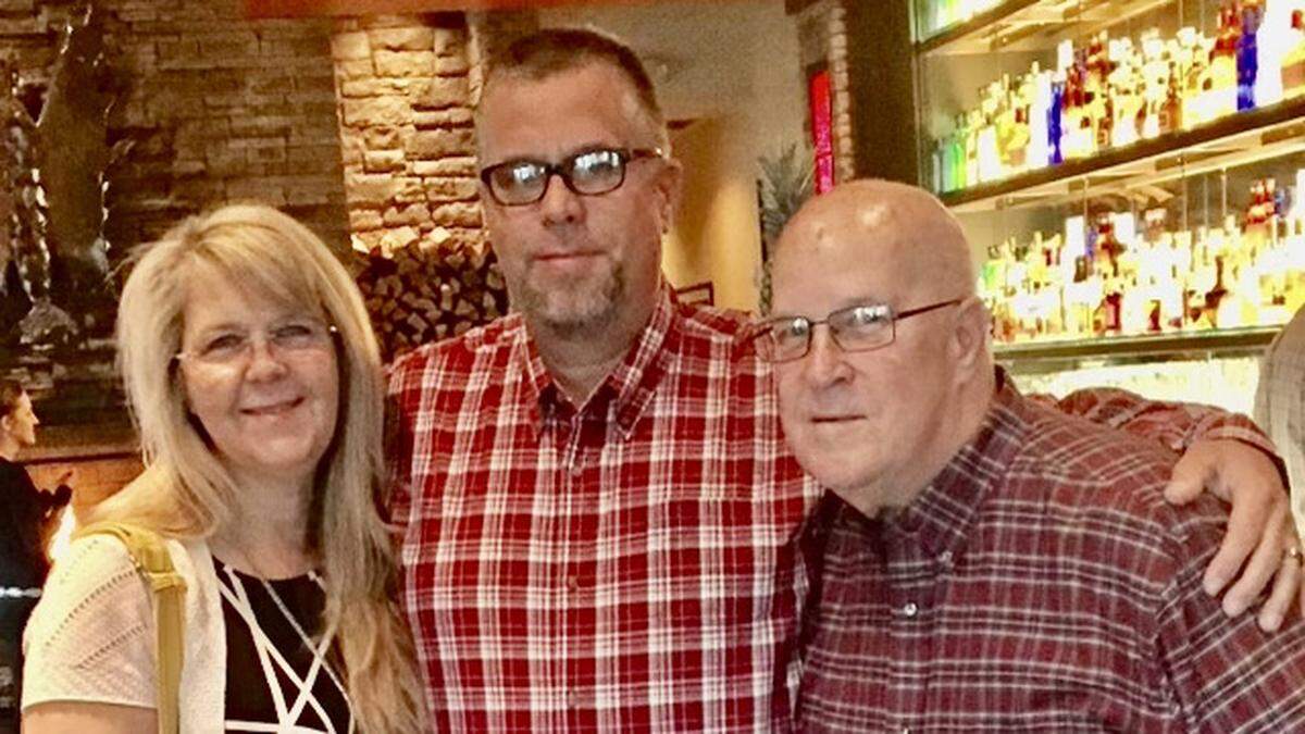 Jerry Koontz, former president of the United Way of Manatee County, is shown with his children, Kathe Neely, and Gerry Koontz.