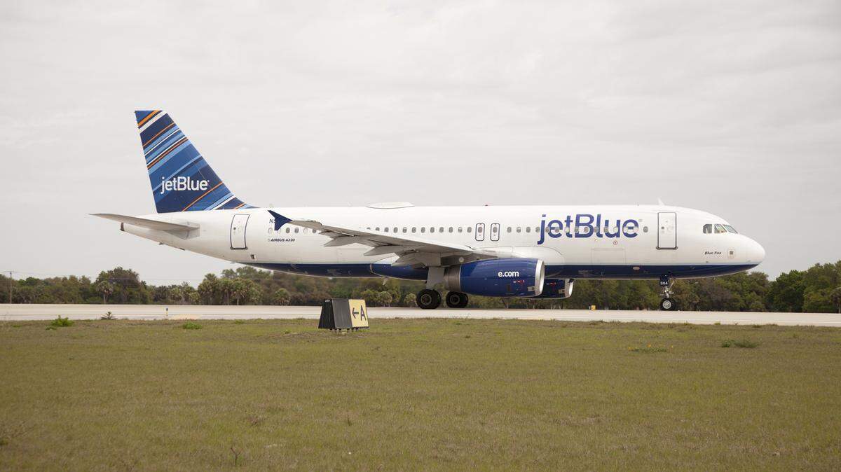 A Jet Blue aircraft rolls over a section of SRQ runway that features two growing depressions in the pavement. The airport's controlling authority is in the process of hiring an engineering firm to evaluate and fix the problem. MATT M. JOHNSON/Bradenton Herald