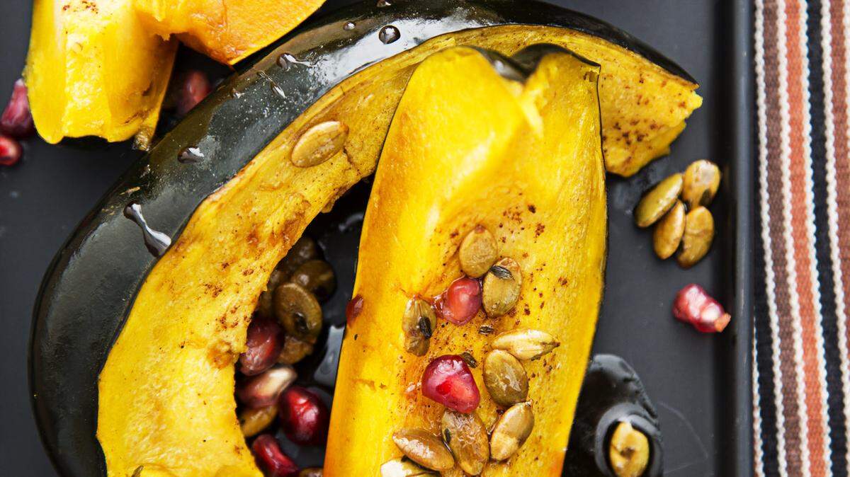 Roasted acorn squash with pumpkin seeds and pomegranate. WASHINGTON POST