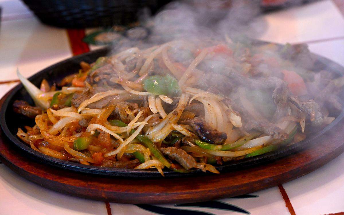 The steaming fajita platter for two at Aqua Tequila Mexican Restaurant Grill and Cantina in Parrish on Feb. 19, 2026.