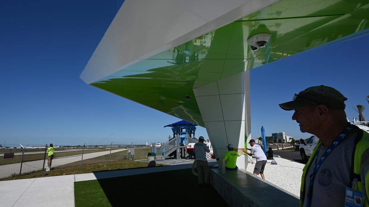 The Sarasota Manatee Airport Authority opened a new observation area at 8330 15th St. E., Sarasota, on Wednesday, March 12. Workers finish up last-minute preparations on Tuesday, March 11.