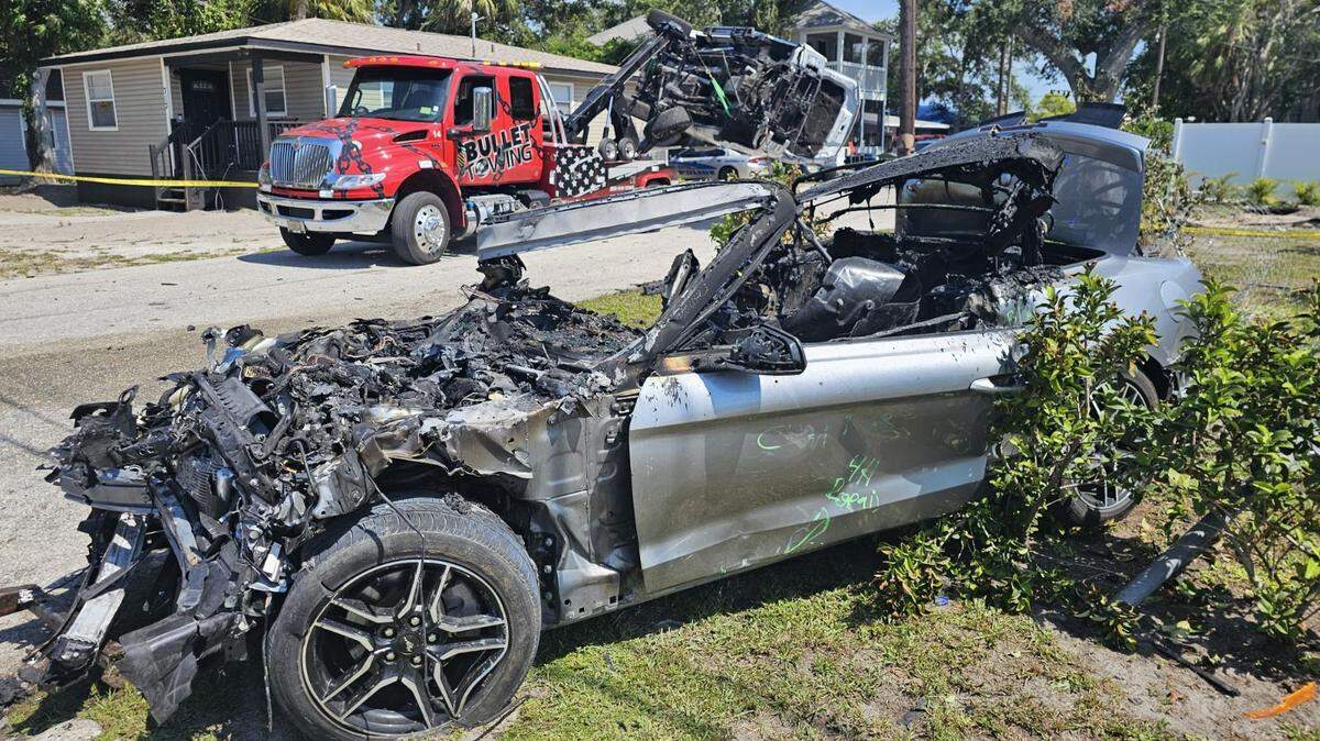 Bradenton police say two stolen vehicles crashed in the 700 block of 12th Ave. W., with one engulfed in flames and the other on its side after hitting the roof of a home.