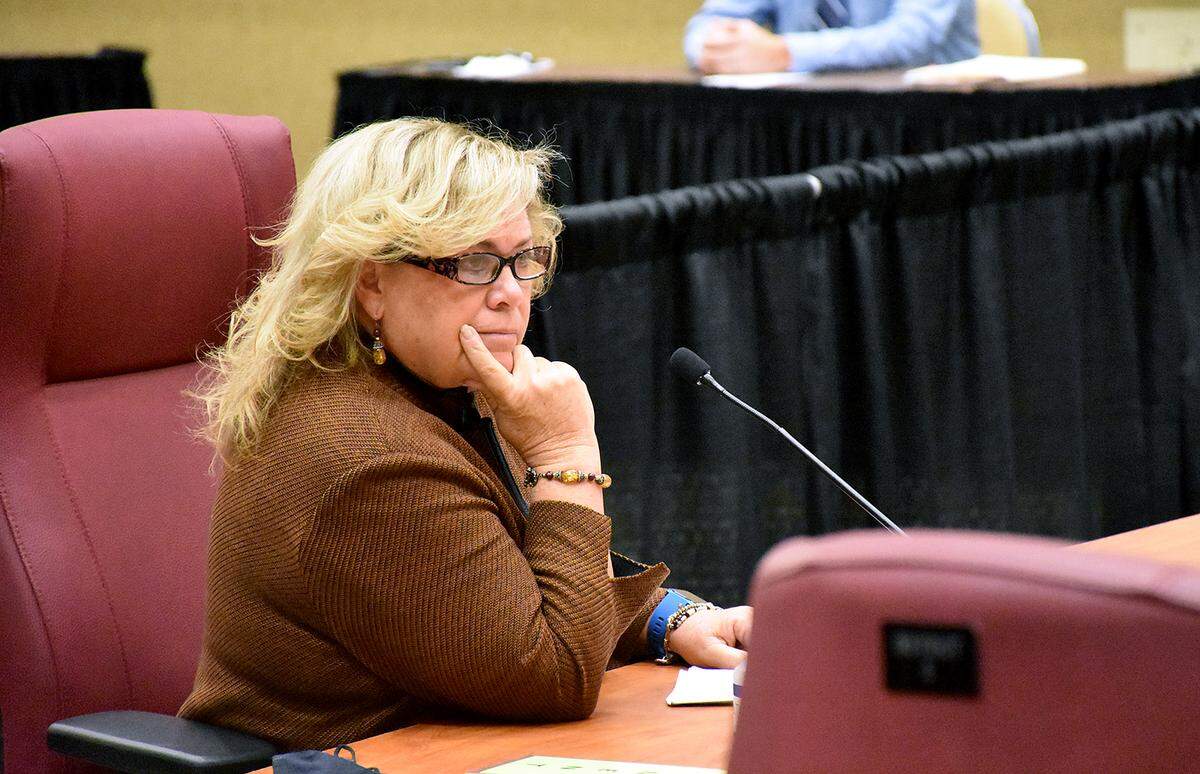 11/19/20--Cheri Coryea listens while at a special meeting to discuss reaction to a potential federal lockdown, new commissioner Kevin Van Ostenbridge brought up a proposal to fire county administrator Coryea.