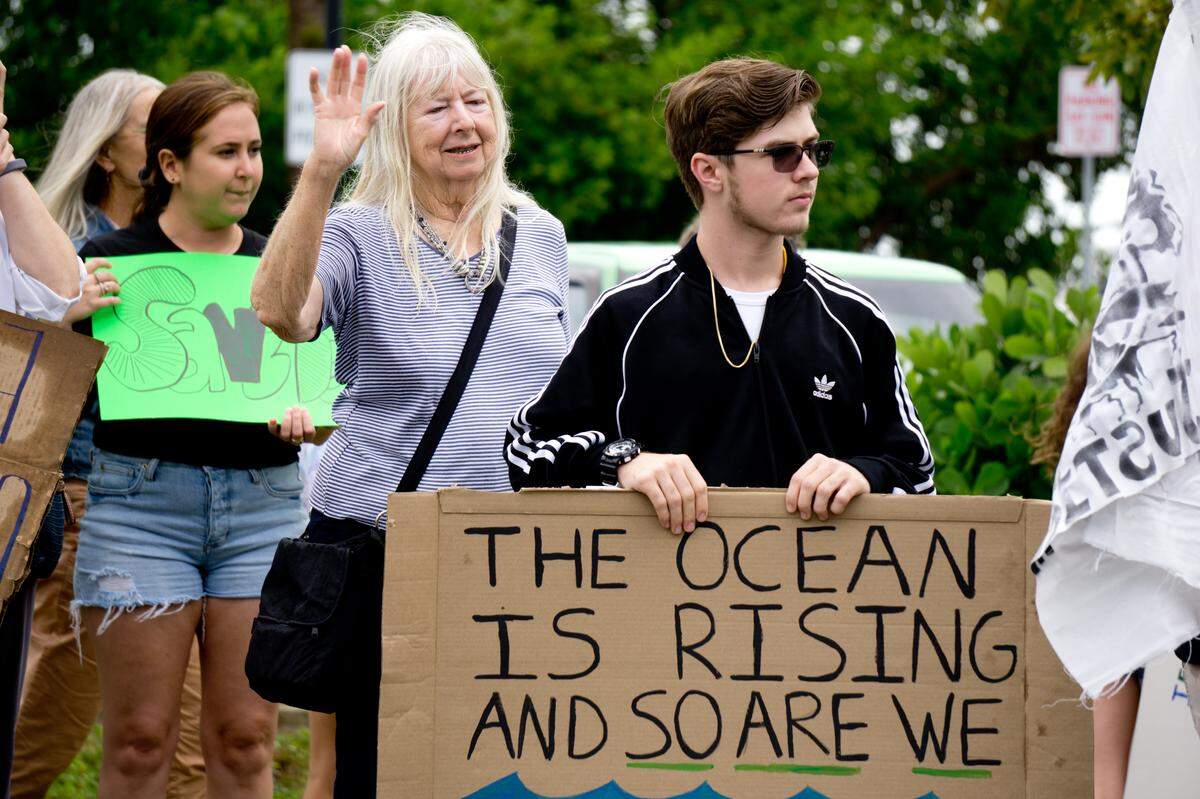 More than 200 people lined the edge of Bayfront Drive, in front of Sarasota’s Unconditional Surrender Statue, to join a global climate strike on Sep. 20, 2019. 