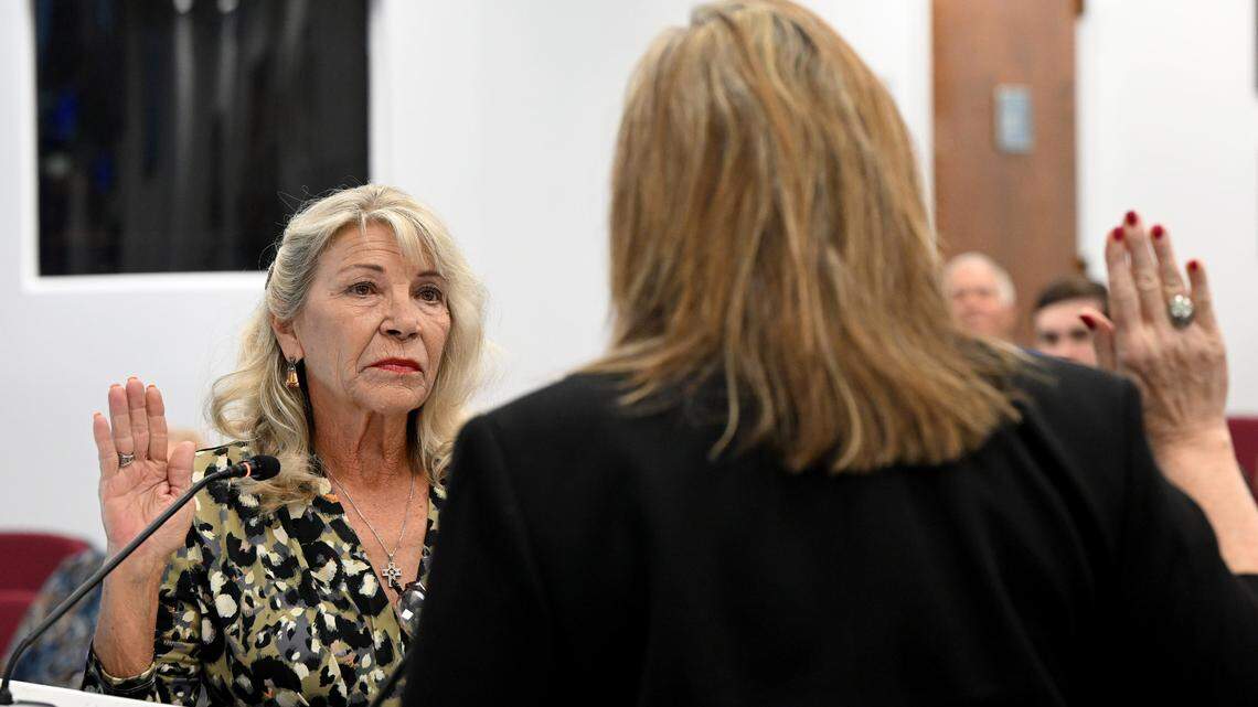 Carol Ann Felts is sworn in as Manatee County Commissioner for District 1 by Angel Colonneso during a swearing-in ceremony in the chambers.