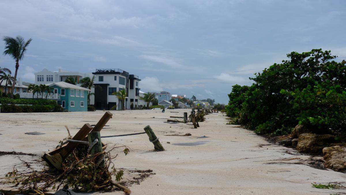 Up to 5 feet of sand covers Gulf Drive after Hurricane Helene battered Anna Maria Island as a Category 4 storm in the Gulf of Mexico.