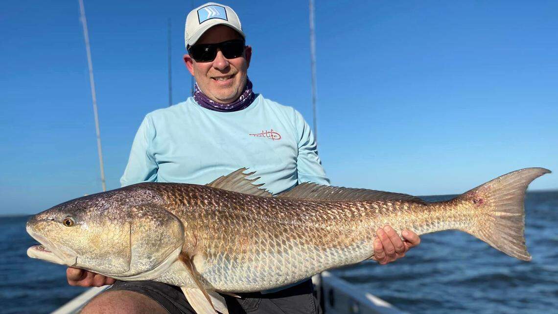 ‘Fish of a lifetime.’ How forgotten rods led to a 47-inch redfish catch in Tampa Bay