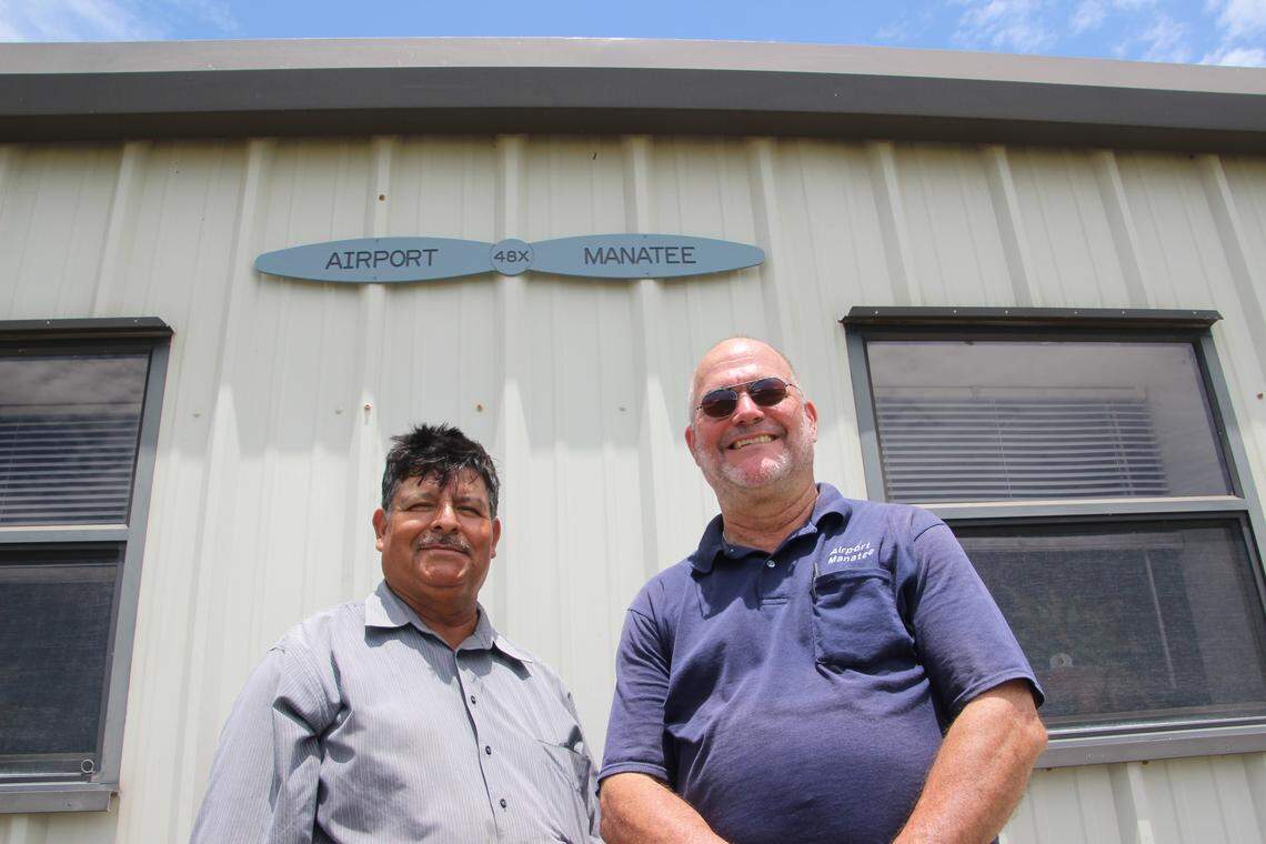 Riccardo Segovia, left, airport grounds and maintenance supervisor, and Tom Reeder, airport manager, are the entire staff of Airport Manatee.