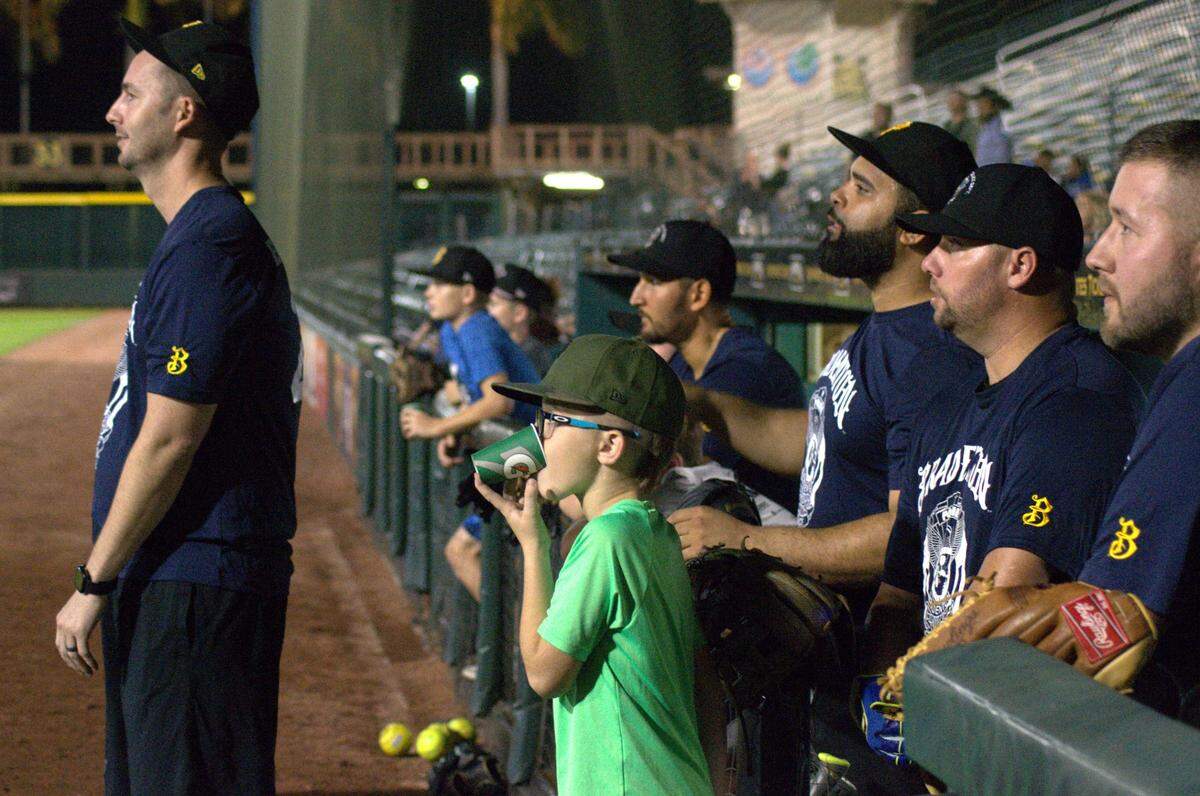 The Bradenton Police Department faced off against the Manatee County Sheriff’s Office in “Battle of the Badges,” a baseball match for charity at LECOM Park on Tuesday.
