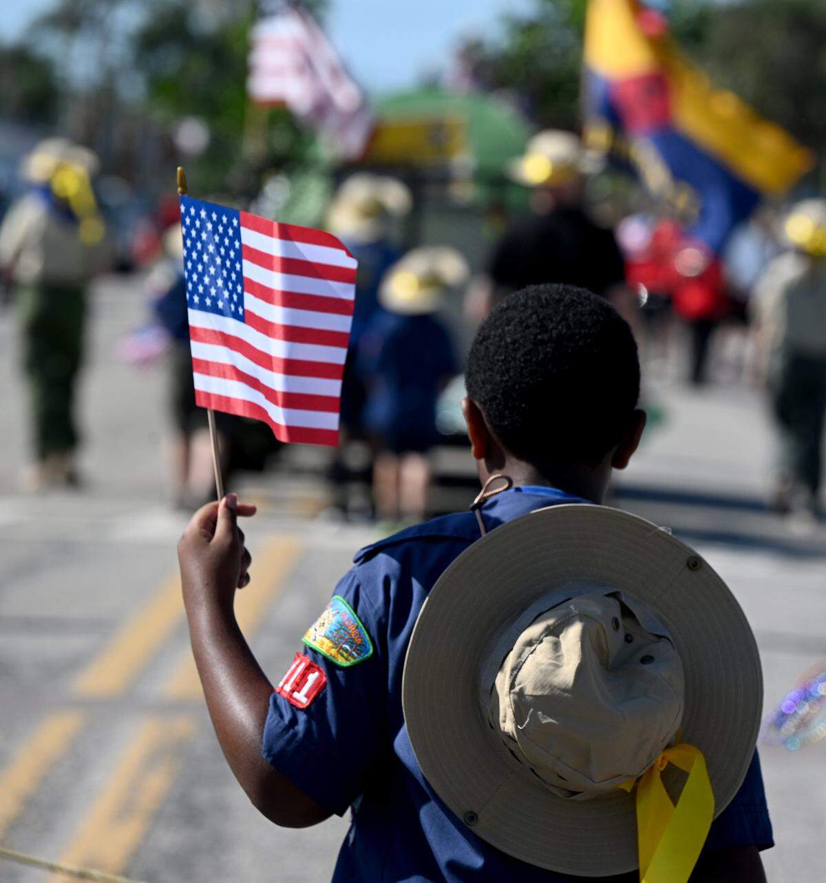 A scout from Pack 111 marches in the annual DeSoto Children’s Parade and Party in the Park in Palmetto on April 18, 2025.