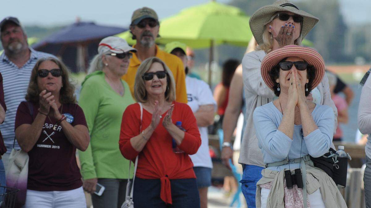 Family and friends of Olympic rowing hopefuls watch the action on a large video screen at the U.S. Olympic & Paralympic Team Trials on Friday at Nathan Benderson Park. 
 GRANT JEFFERIES/Bradenton Herald