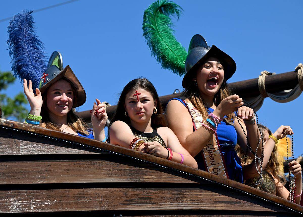 Beads are flung from a pirate ship the annual DeSoto Children’s Parade and Party in the Park in Palmetto on April 18, 2025.