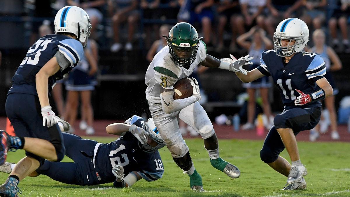 St. Stephen’s Jordan Edwards runs the ball during Friday night’s game at Out of Door Academy.