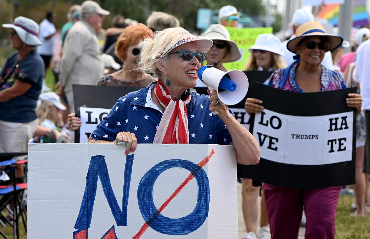 Hundreds of protestors gathered Saturday, April 5, 2025, on Cortez Road West in one of the many national “Hands off” protests against President Donald Trump’s policies.
