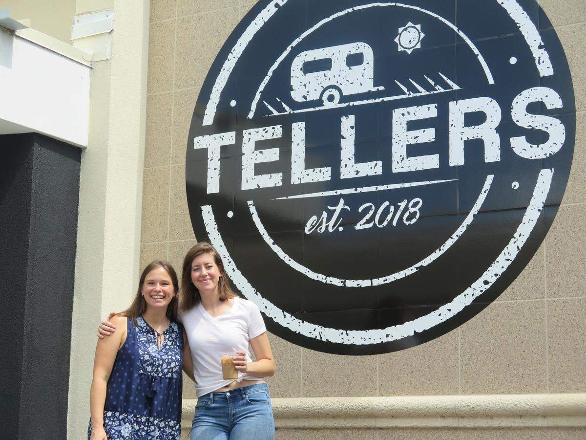 Lauri Contarino (left) an Erica McCreadie are set to open Tellers, their co-owned coffee shop on the south side of the Bakker Building, which used to be a Bank of America branch, Monday, June 25. Service will be primarily focused on quick to-go orders, just like in larger cities across the world, from a retrofitted bank teller window.