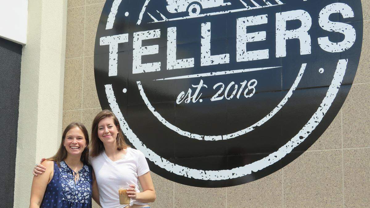 Lauri Contarino (left) an Erica McCreadie are set to open Tellers, their co-owned coffee shop on the south side of the Bakker Building, which used to be a Bank of America branch, Monday, June 25. Service will be primarily focused on quick to-go orders, just like in larger cities across the world, from a retrofitted bank teller window.