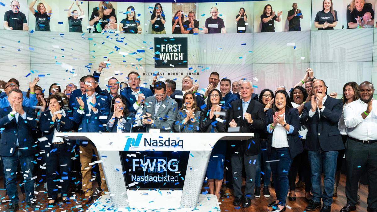 First Watch associates celebrate the company’s initial public offering of stock shares at NASDAQ in New York City on Friday.