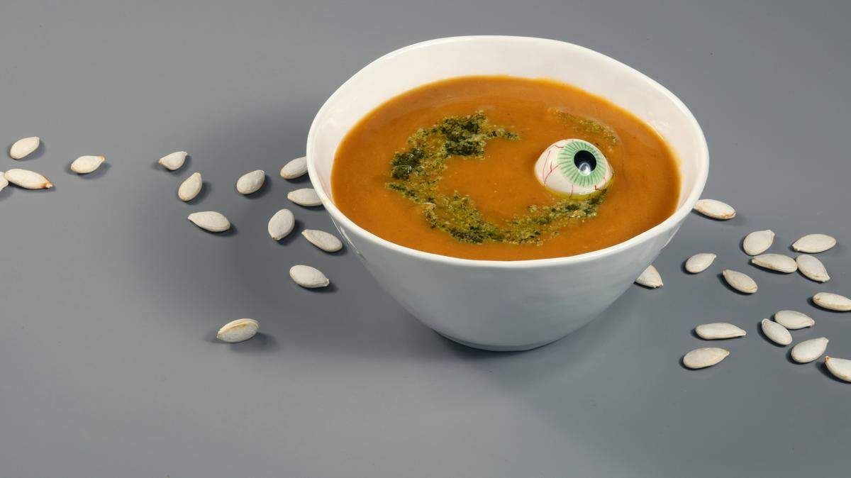 Pumpkin seed pesto is a great topper for soup. The eyeball is optional. TNS