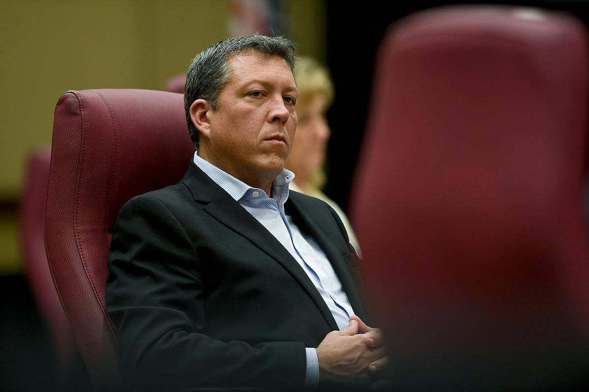 01/26/21--County Commissioner George Kruse listens after making an apology for an affair during a meeting of the Board of County Commissioners Tuesday.