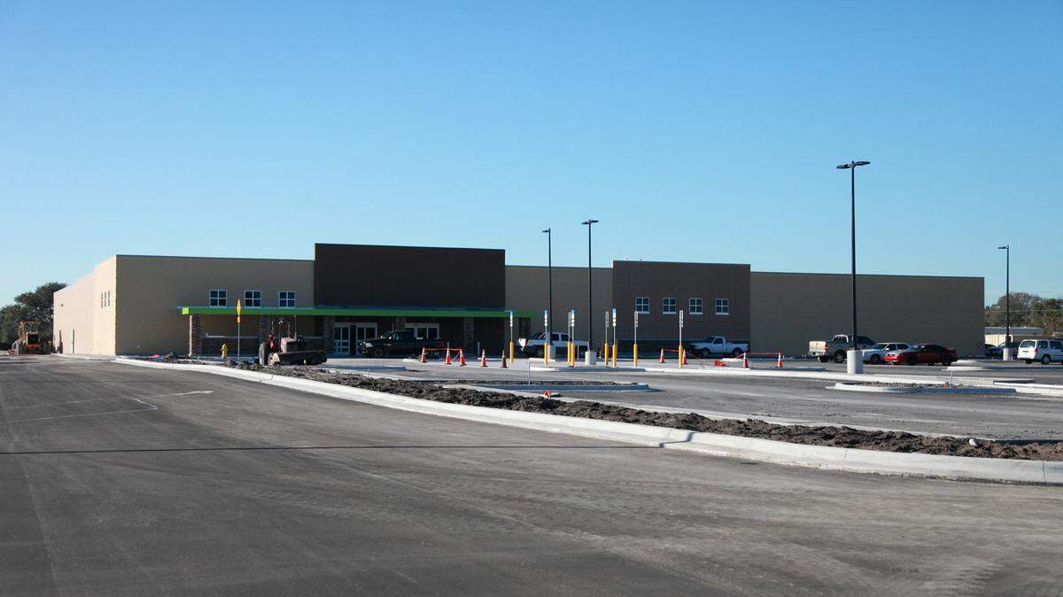 About 5.8 acres that is home to a Wal-Mart Neighborhood Market parking lot and entry drive in East Manatee has sold for $5.9 million to a Miami company. MATT M. JOHNSON/Bradenton Herald