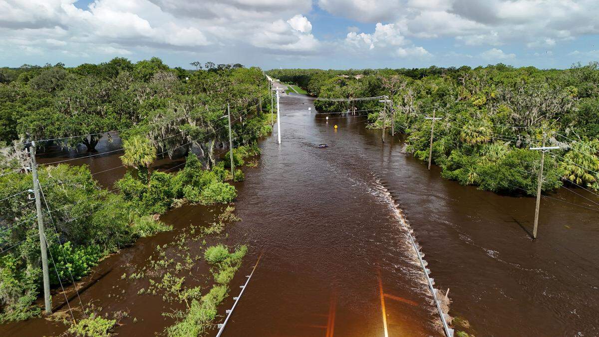 Flood waters made areas of East Manatee County, including portions of Upper Manatee River Road, impassable after Hurricane Debby.