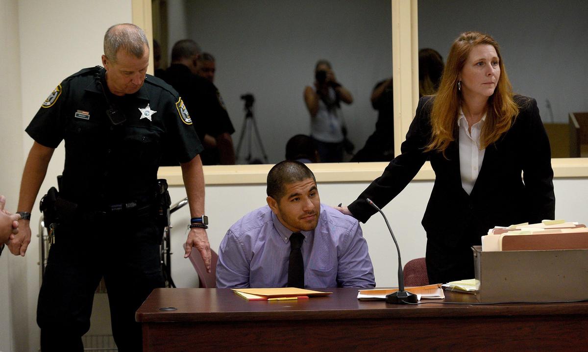 Orlando Valenzuela takes his seat in the courtroom with his attorney Jennifer Joynt Sanchez at the Manatee County Jail during his resentencing hearing. Valenzuela was originally sentenced to life for the 2nd degree murder of 9-year-old Stacy Williams.