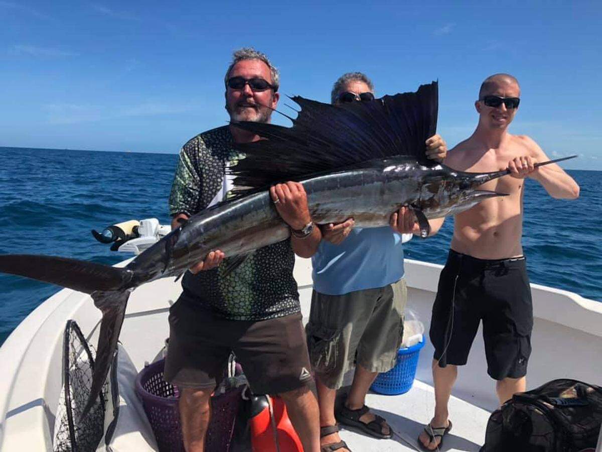 In this photo taken in 2020, Anglers pose with a sailfish they landed while fishing about seven miles west of Anna Maria Island during an excursion with Captain Will Osborne.