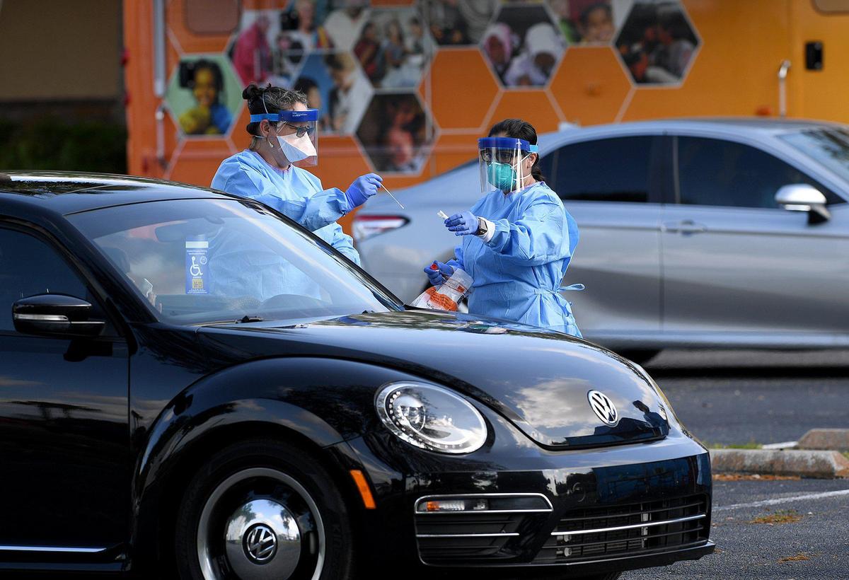 Manatee County residents get tested for the novel coronavirus at a new drive-thru testing site at the Bradenton Area Convention Center in Palmetto.