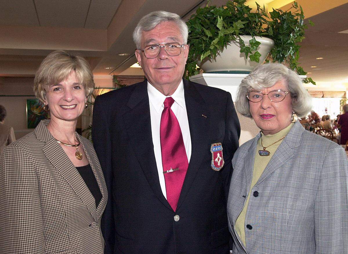 11/9/01--Kris Murphy, Dr. Tom Sprenger and Justine Sprenger are shown at a 2001 luncheon/fashion show at the El Conquistador Country Club for the Manatee Symphony Association.