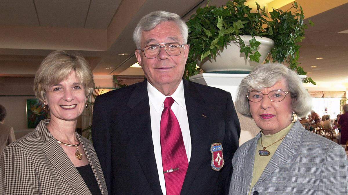 11/9/01--Kris Murphy, Dr. Tom Sprenger and Justine Sprenger are shown at a 2001 luncheon/fashion show at the El Conquistador Country Club for the Manatee Symphony Association.