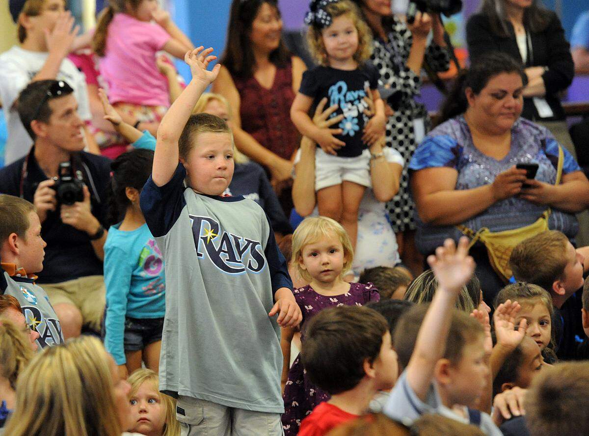 A little boy raises his hand to win an autographed baseball from Evan Longoria, who was at the Manatee County Central Library in 2015 as part of the Reading with the Rays series. Rays left-handed pitcher Ryan Yarbrough will be at the library on Aug. 3. to read with the children.