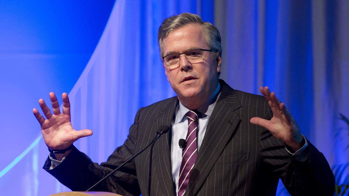 Florida Gov. Jeb Bush gestures as he speaks at the Inside ITFs Conference at the Westin Diplomat Resort & Spa in Hollywood, Fla., on Jan. 29, 2014. 
 AP Photo/Wilfredo Lee