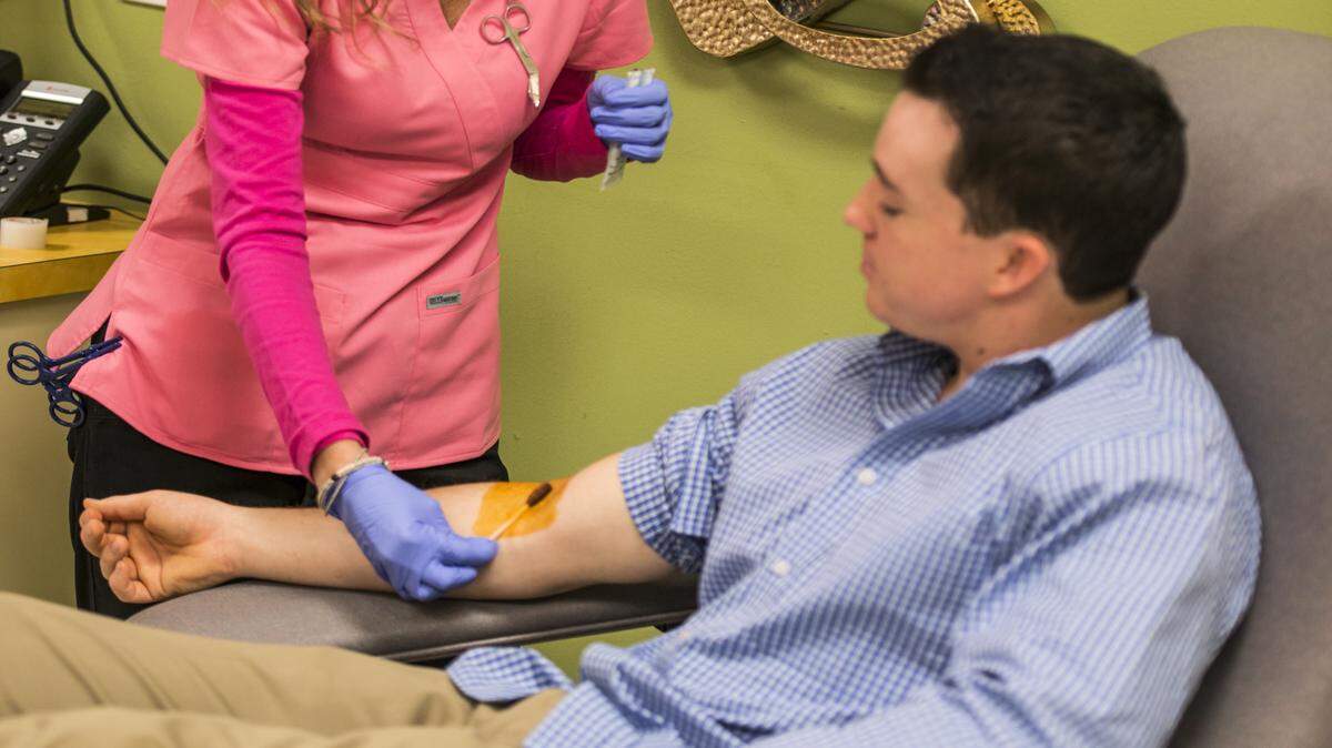 A patient gives blood recently at a SunCoast Blood Bank donation center in Manatee County. 
 PROVIDED PHOTO