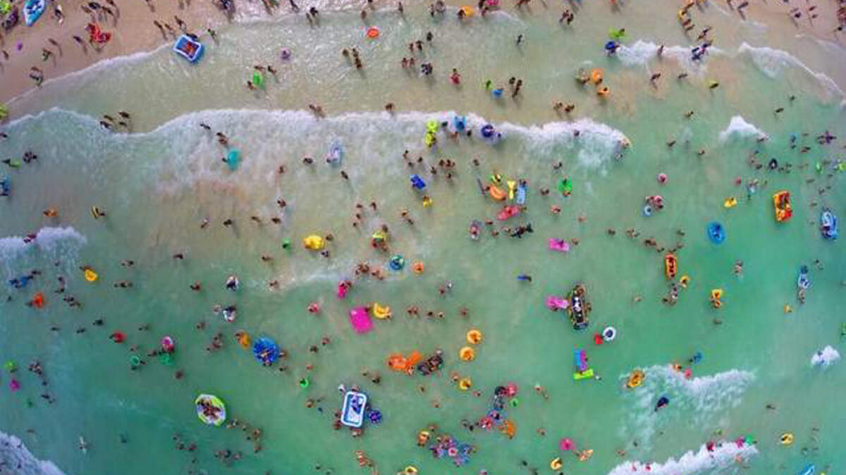 A drone view of 'Floatopians' taking part in the non-sanctioned Floatopia Miami event on Miami Beach in 2014. Floatopia touts a fun atmosphere on the beaches by encouraging people to bring rafts and other floats to the beach for a communal experience. 
 MIAMI HERALD FILE