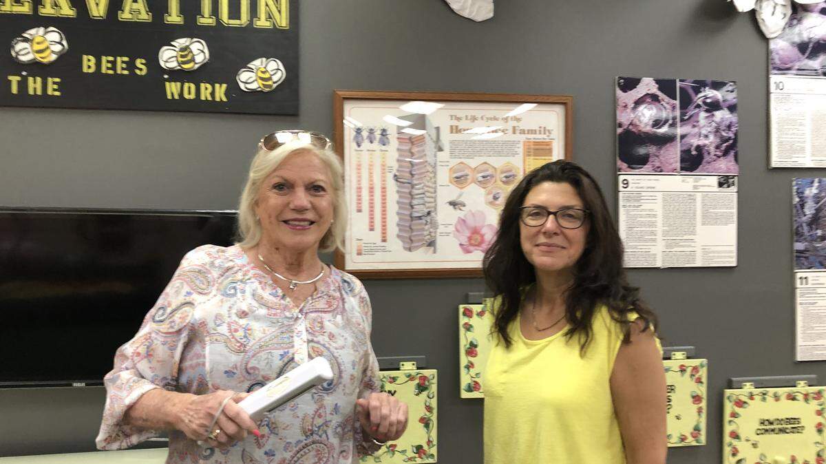 Mixon Fruit Farms, 2525 27th St. E., Bradenton, reopens on June 6, after being closed for two months because of the COVID-19 pandemic. Janet Mixon and Leslie Armstrong, right, are shown above in the new bee exhibit.
