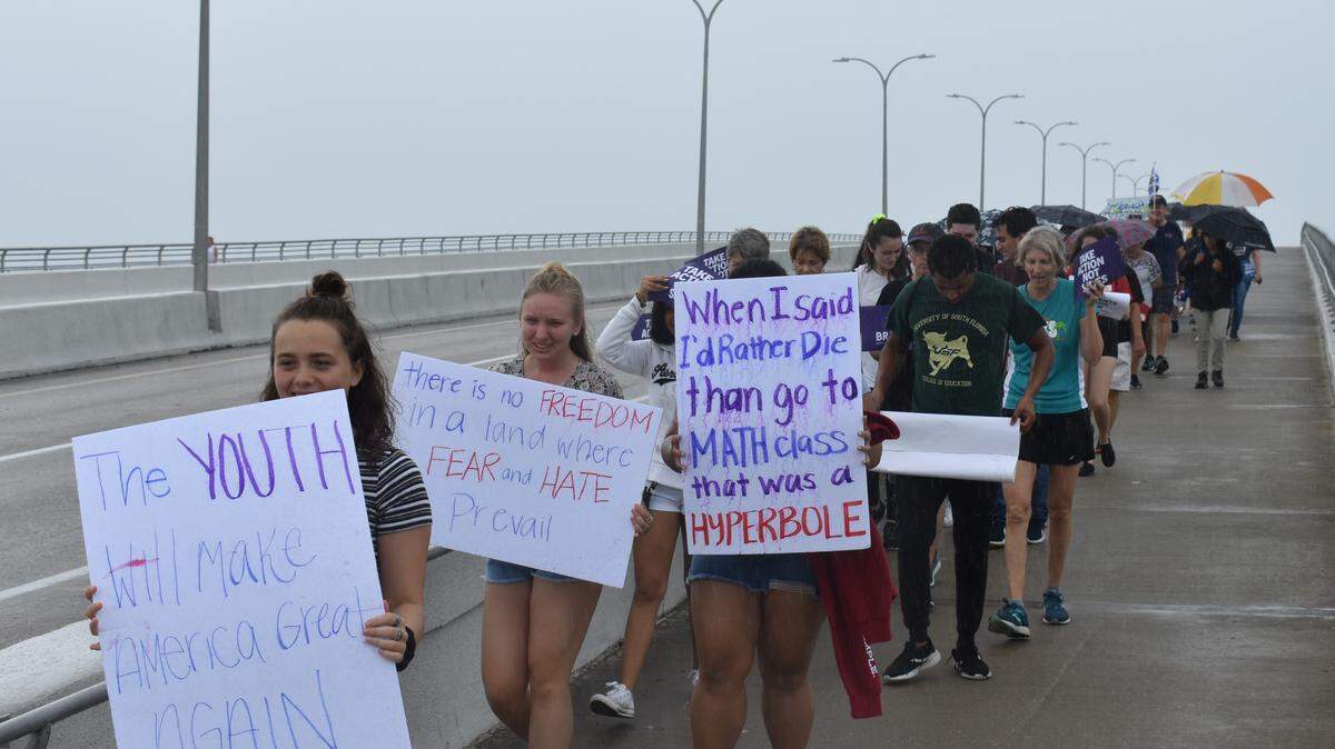 The threat of rain seemed to clear out before the March For Our Lives began Saturday morning, but protesters were drenched in the final stretch of their hike across the John Ringling Causeway in downtown Sarasota.
