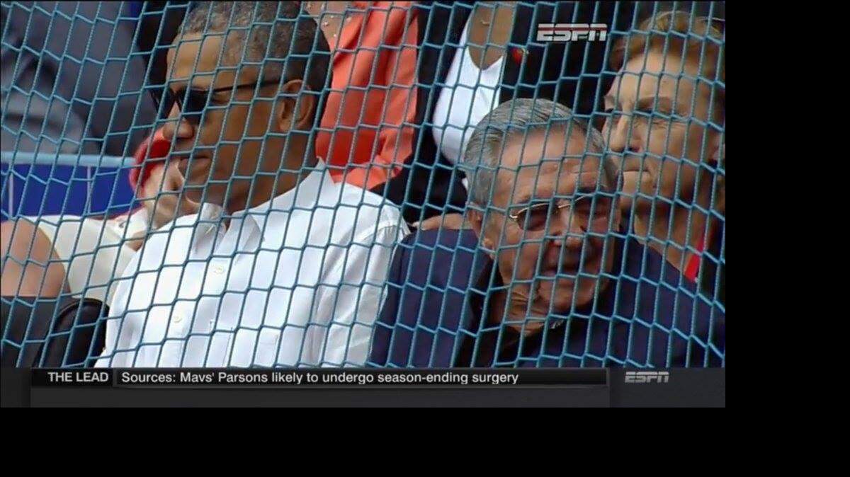 President Barack Obama and Cuban leader Raul Castro sit next to each other behind home plate at the Tampa Bay vs. Cuban national team baseball game in Havana. Photo via ESPN