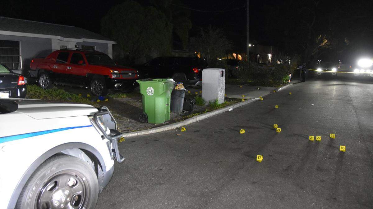 Yellow evidence markers can be seen at the scene of shooting where three people were injured on Monday, Jan. 23, 2023.