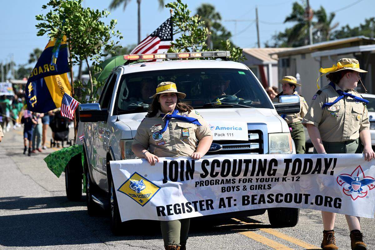 Cub Scout Pack 111 march in the annual DeSoto Children’s Parade and Party in the Park in Palmetto on April 18, 2025.