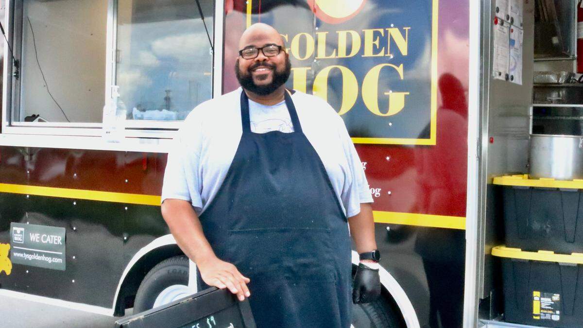 Ty Martin, owner and pit master for Ty’s Golden Hog food truck and catering, shown above May 4, 2022, went into business in Parrish in November and has since taken his barbecue all over Manatee County.