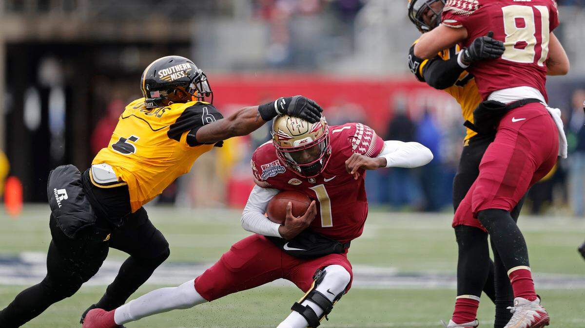 In this file photo, Southern Mississippi defensive back Kelsey Douglas (6) tries to tackle Florida State quarterback James Blackman (1) on a carry in the first half of the Independence Bowl NCAA college football game in Shreveport, La., Wednesday, Dec. 27, 2017.