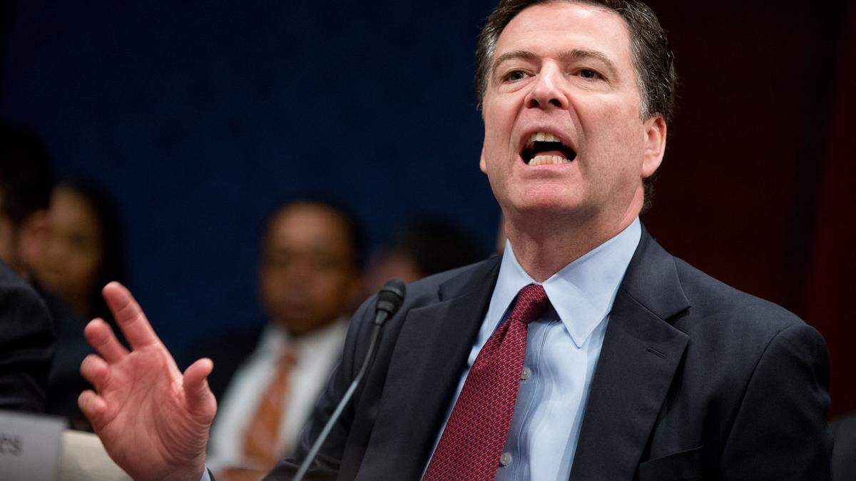 FBI Director James Comey speaks at a House Intelligence Committee hearing on world wide threats on Capitol Hill in Washington, Thursday, Feb. 25, 2016. Comey says the issues raised in the Justice Department's dispute with Apple Inc. represent the "hardest question I've seen in government." (AP Photo/Andrew Harnik)