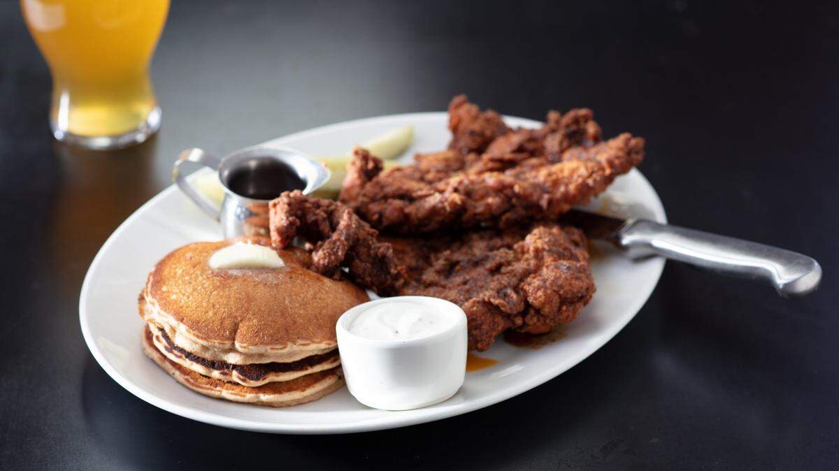 Yard House, known for having more than 100 beers on tap,&nbsp; along with craft cocktails, tacos, burgers, seafood and steaks, served with a helping of rock music, opened Sunday at University Town Center. Shown above is Yard House Nashville Hot Chicken with Sweet Potato Pancakes.