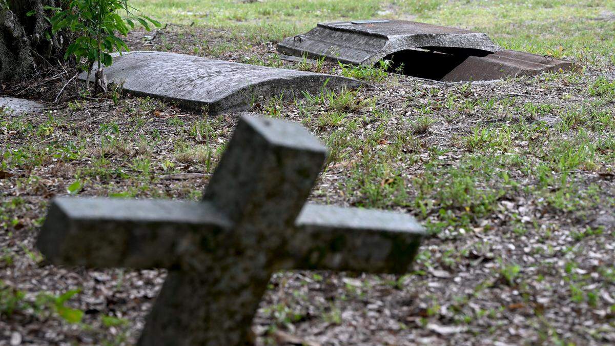 The Old Memphis Cemetery in Palmetto was the target of apparent vandals who smashed graves, headstones and spray-painted. Photos taken on May 12, 2026.