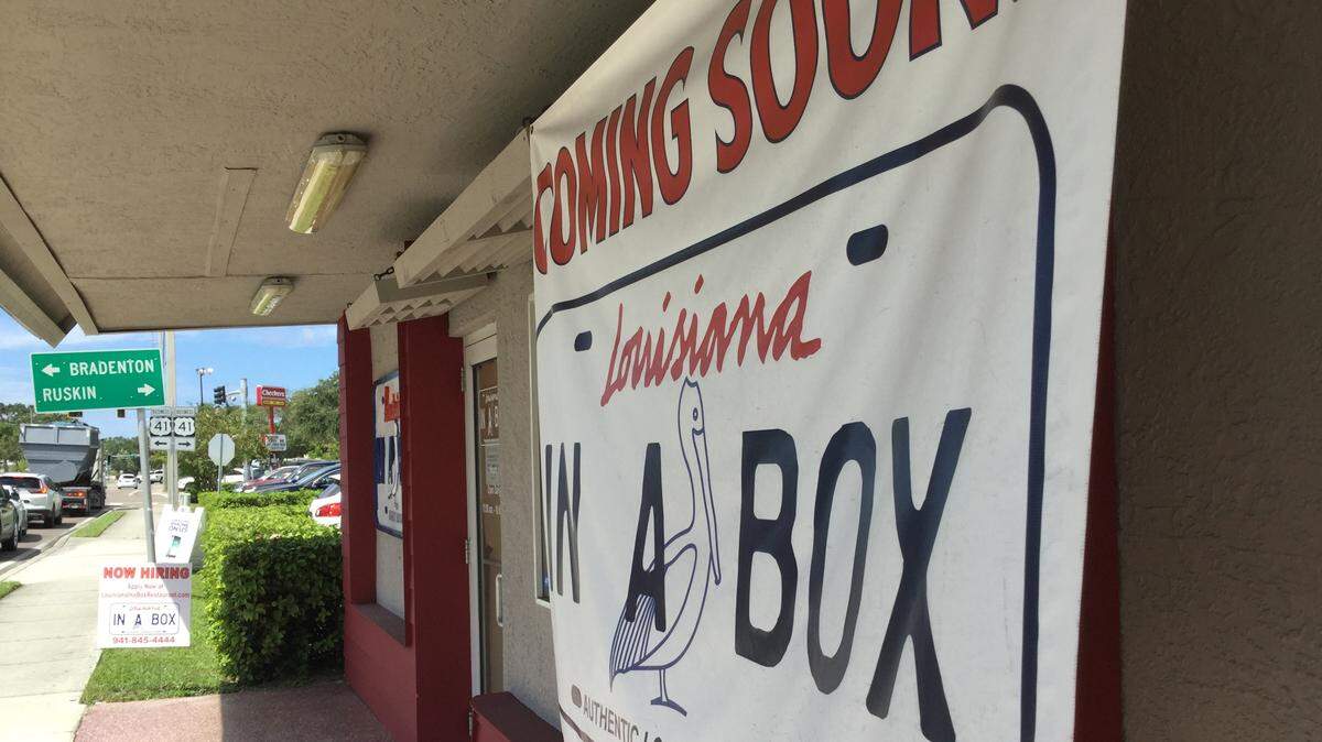 The sign reads a new restaurant is coming to Palmetto, but the owners are almost as mysterious as the legacy of the building they hope to soon occupy.