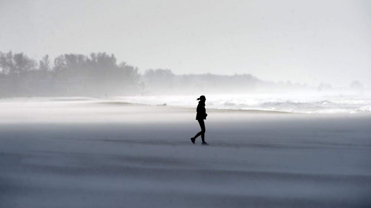 High wind conditions stir up the surf and sand along Anna Maria Island on Saturday.GRANT JEFFERIES/Bradenton Herald