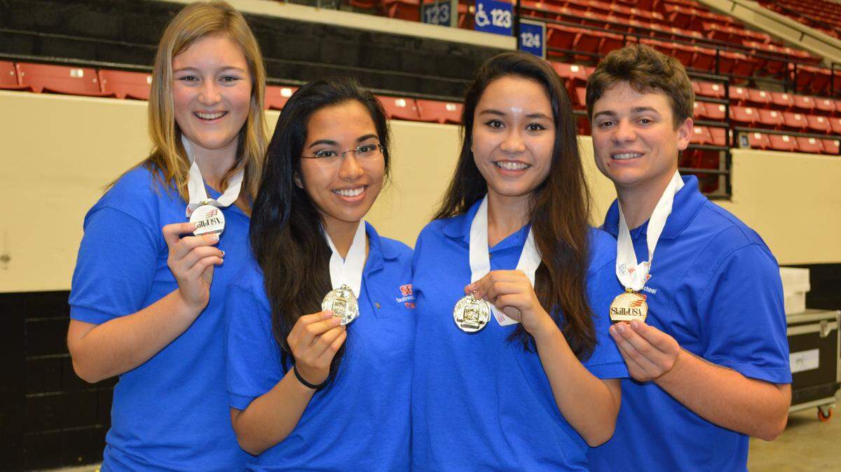 BROADCAST NEWS SKILLS: Southeast High School's broadcast news team poses in Lakeland for a photo after winning a SkillsUSA state championship. PHOTO PROVIDED