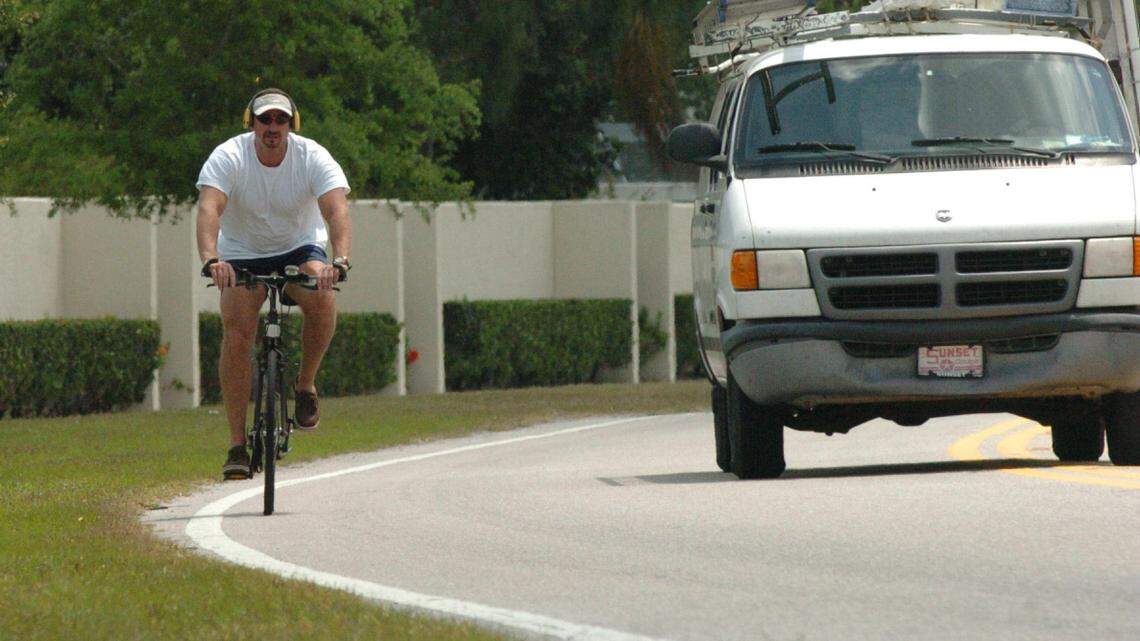 A cyclist rides his bike along Whitfield Avenue in the Palm Aire community in this 2006 file photograph. Manatee County Commission heard a presentation on the bicycle/pedestrian/trails Pplan and will also a review of the FDOT draft tentative work program. 
 File Photo-GRANT JEFFERIES/Bradenton Herald