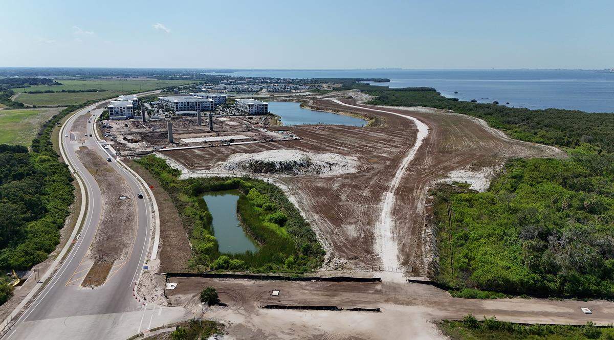 View of the developments along El Conquistador Parkway on Sarasota Bay called Cirrus and further on, Aqua, looking South.